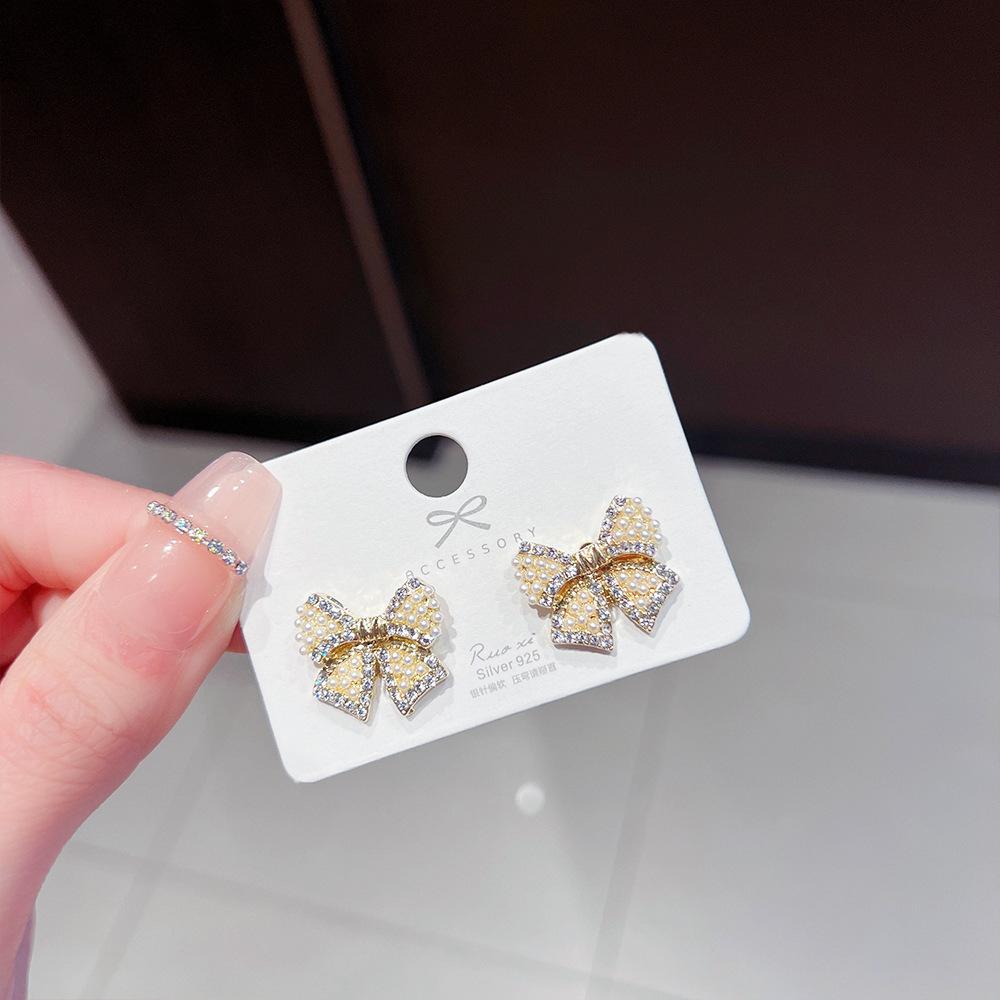 S925 Silver Needle Sweet Versatile Unique Imitation Pearl Bow Stud Earrings Trendy Niche Design Sense Premium Earrings