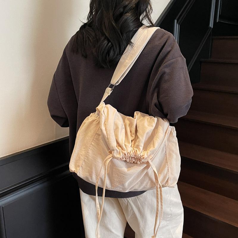 Large capacity drawstring nylon canvas bag women's new fashion bucket bag casual solid color shoulder messenger bag