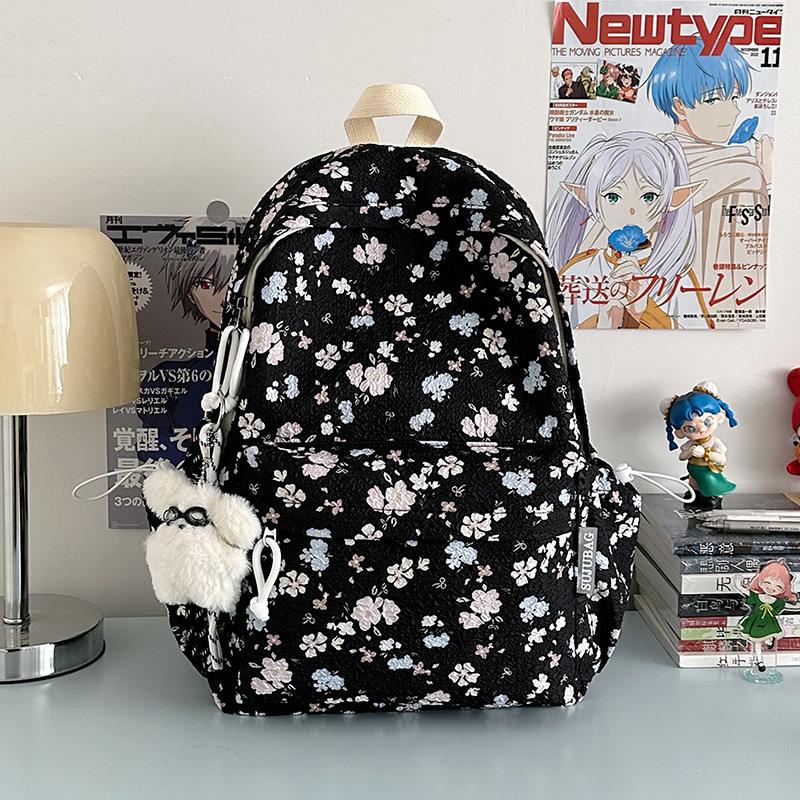 Korean ins cute little floral high-value schoolbag junior high school girls large-capacity backpack high school students casual shoulders