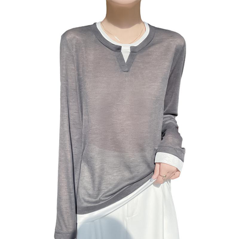 A Multicolored Knitted Sweater A Summer Thin Long-sleeved T-shirt Is Worn Over A Top As A Base Layer