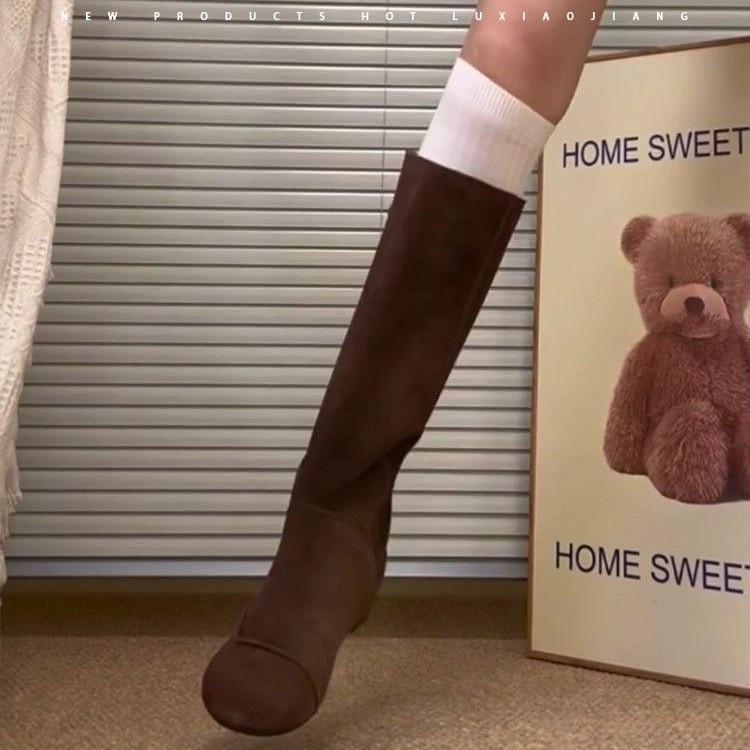 Huge good-looking huge versatile inner heightening suede pile high boots women's 2025 autumn and winter retro flat boots boots