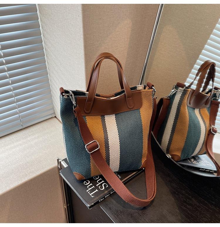 

Commuter canvas bag women 2025 new versatile shoulder messenger bag popular this year portable tote bag синий