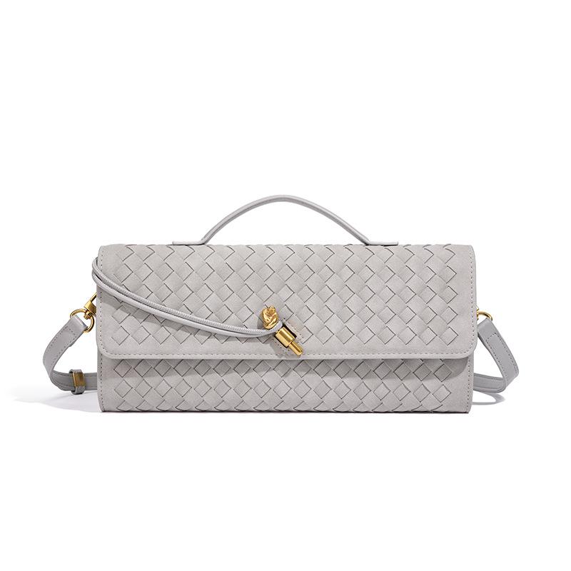 

Y specializes in hand-woven shoulder organ bags, fashionable horizontal square clutch bags, versatile oblique span bags. 31*15*5 светло-серый