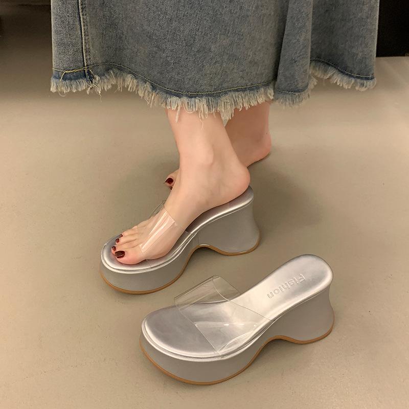 In the summer of 2025, the new thick-soled one-word transparent belt slippers with wedge heels and high-heeled sandals wear muffin women's shoes