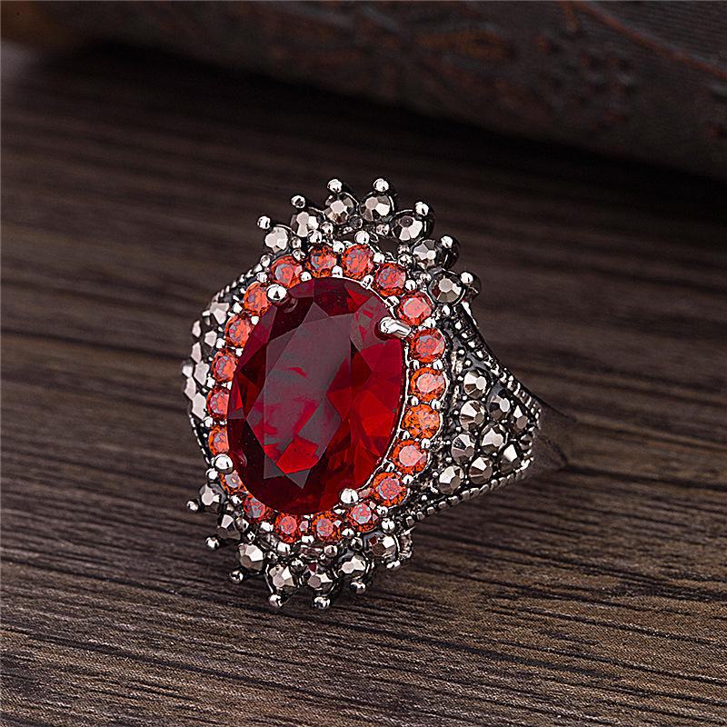 Wish Silver Jewelry: Retro Thai Silver Gemstone Ring with Red Pomegranate and Exaggerated Black Design
