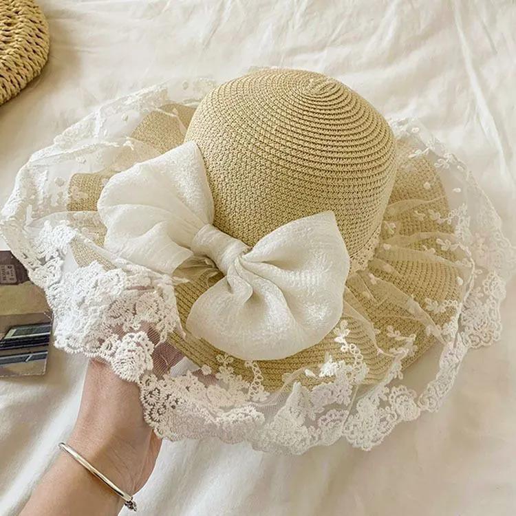 WTEMPO Простые элегантные повседневные соломенные шляпы с кружевным бантом, летние широкополые шляпы с защитой от солнца, пляжные шляпы-ведра 1pc бежевый