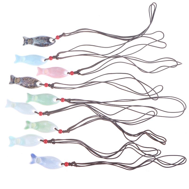 Collane Ciondolo Fischietto Pesce in Ceramica Stile Cinese Fischietto Fatto a Mano Liscio Collana con Fascino Delicato Catena per Maglione Unisex