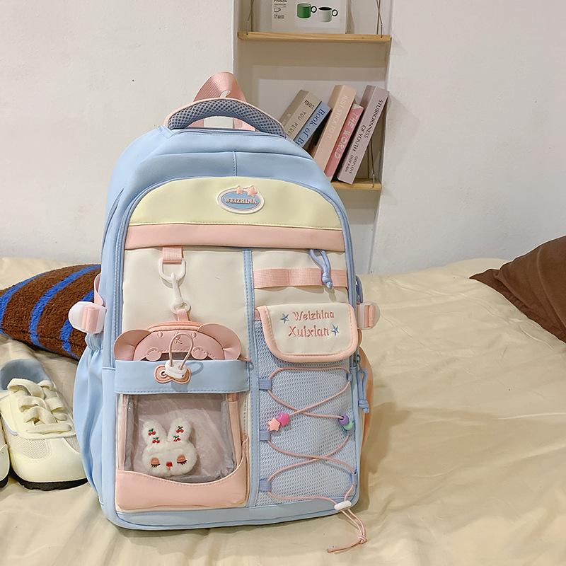 Japanese new high-value, fresh and sweet contrasting colors splicing junior high school students backpack women's lightweight backpack