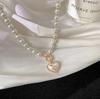 New Super Fairy Imitation Pearl Heart Necklace: Cold Style Sweet Simple OT Buckle Clavicle Woven Chain for Women