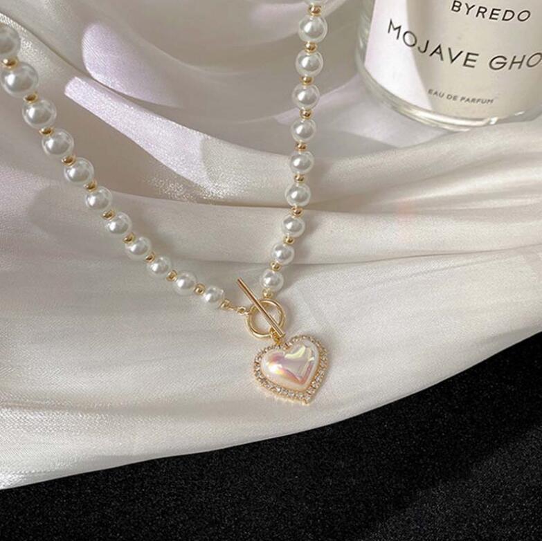 New Super Fairy Imitation Pearl Heart Necklace: Cold Style Sweet Simple OT Buckle Clavicle Woven Chain for Women