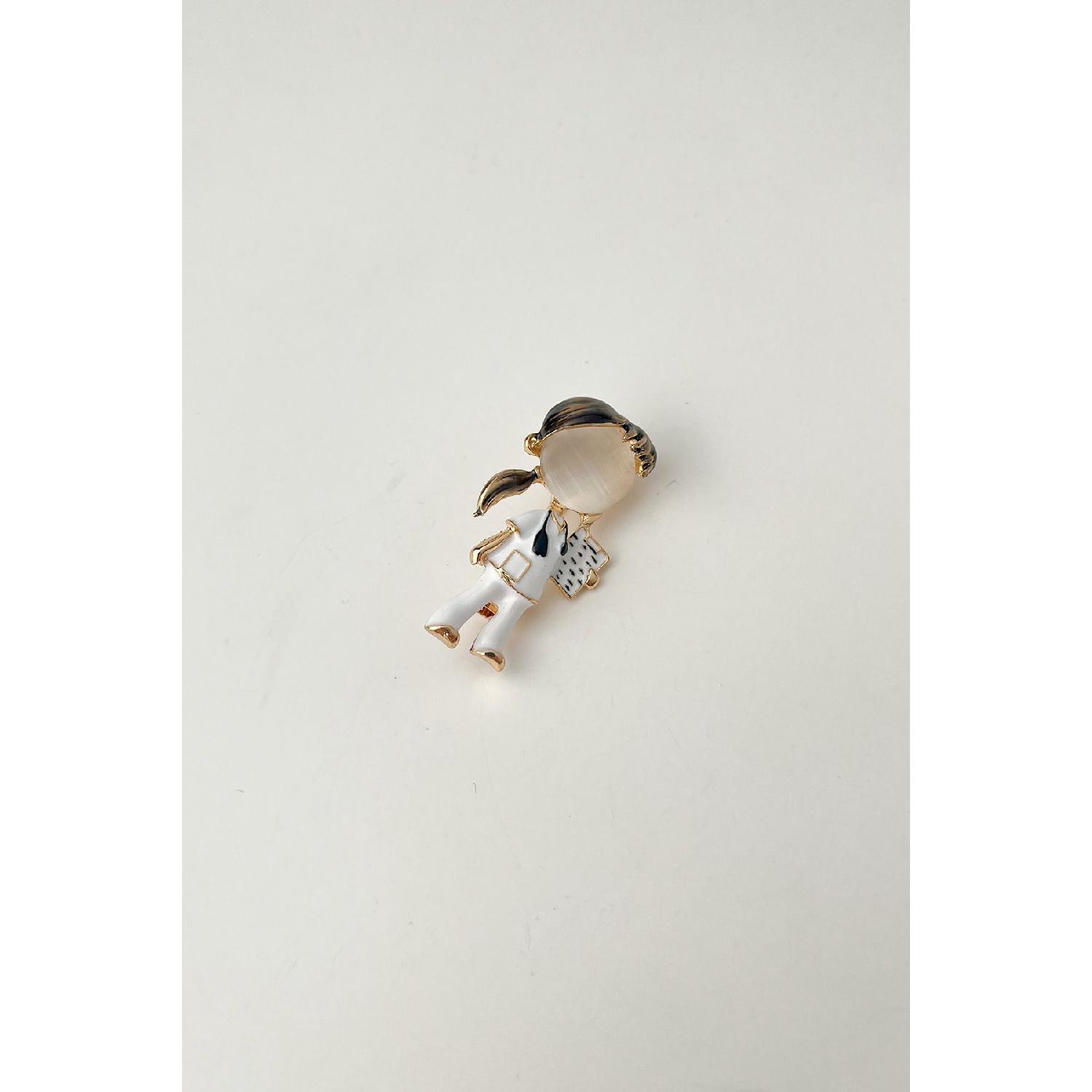 

Black Haired Enamel Nurse Brooch (dimension: 4 cm)