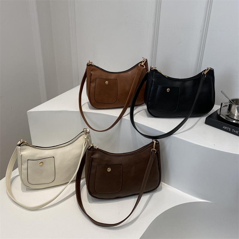 Retro tekstura jednolity kolor duża pojemność wczesna wiosna nowy prosta tekstura modny ukośny span pod pachą torba na ramię