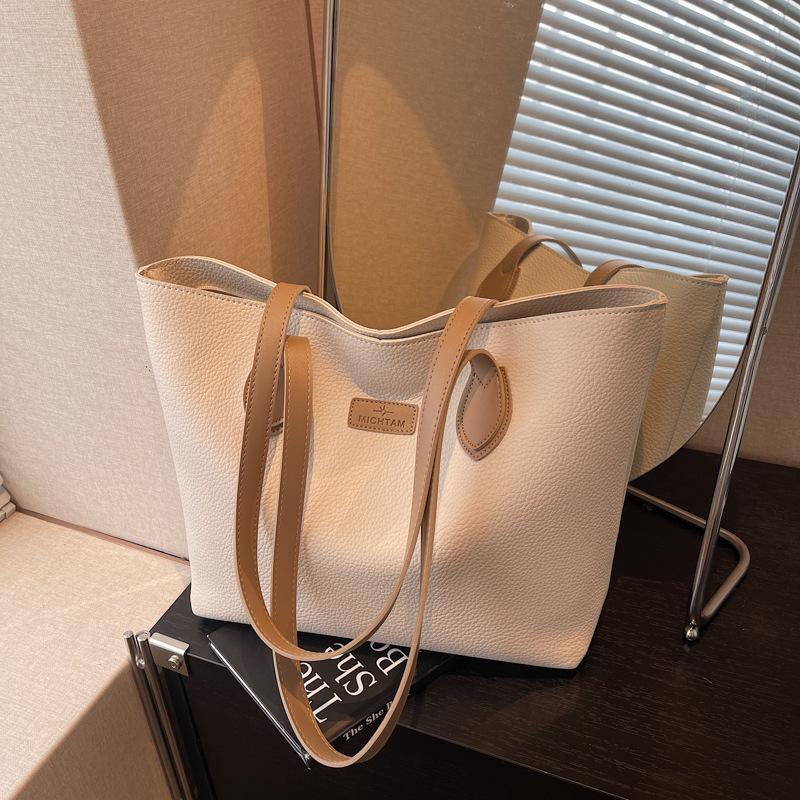 

Large capacity simple tote bag women s new high-end fashion shoulder bag niche class commuter bag покинуть белый
