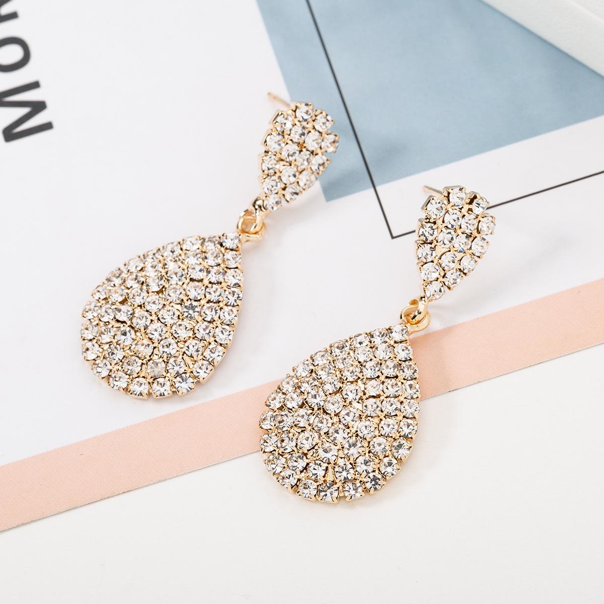 

Свадебные серьги-капли со стразами и цепочкой-коготь - модный аксессуар E603