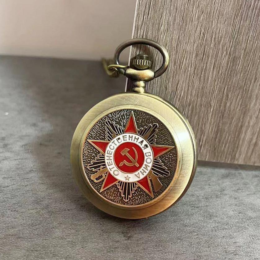 

Старинные карманные часы с большим рельефным узором в виде пятиконечной звезды, серпа, молота, раскладушки, винтажные