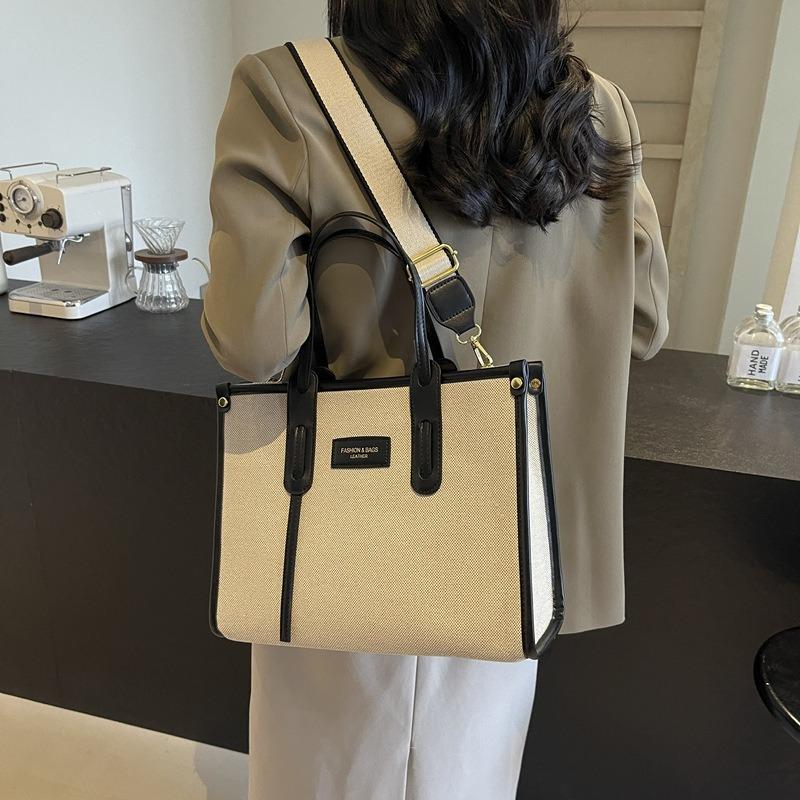 Commuter largecapacity canvas bag women's new popular commuter versatile messenger bag fashionable portable tote bag