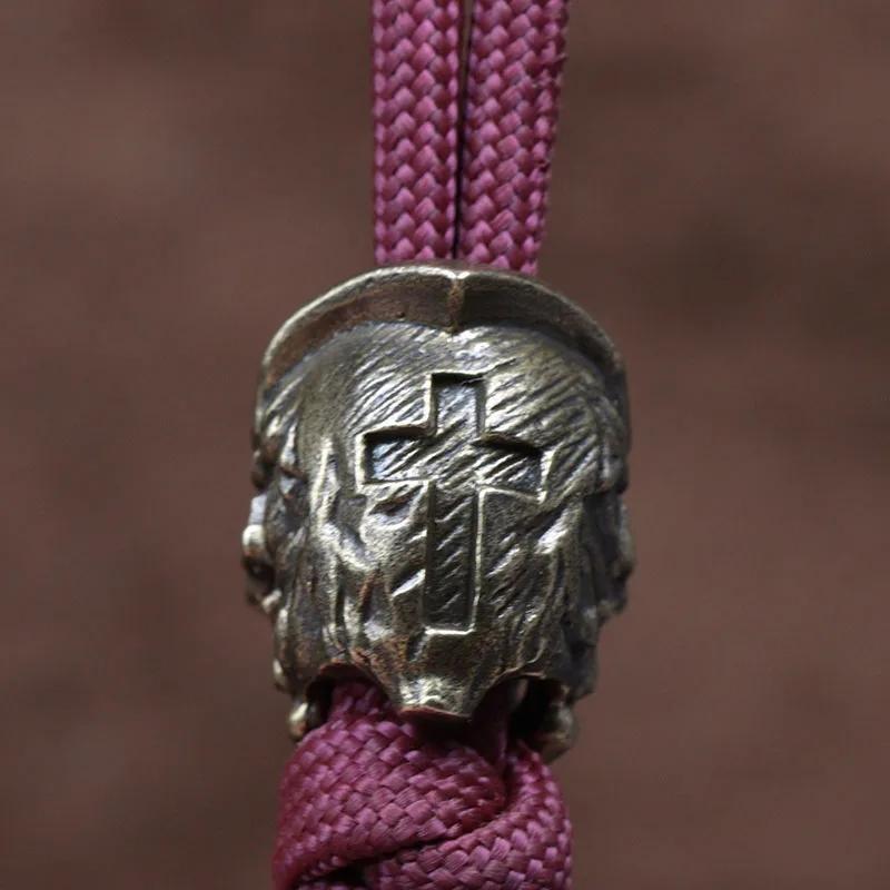 Cross Skull Head Mosazný nůž Korálky EDC DIY Paracord Tkané náramky Přívěsky na řetízky Příslušenství Venkovní závěsy na nářadí Tretky