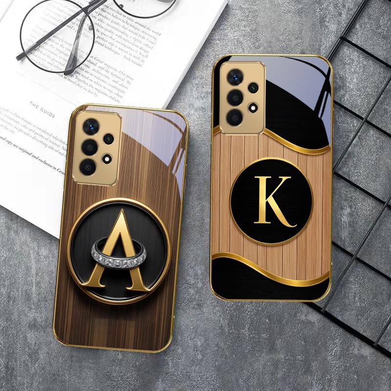 Luxurious emblem letters For Samsung A 01 52S A04 A05S A10 A12 13 22 23 24 36 42 M02 Note 10 20Ultra 8 9 Golden glass phone case