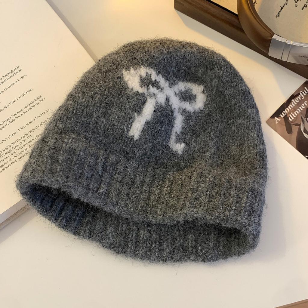 Bow plush knitted hat women's Japanese versatile face small wool hat big head circumference warm bag head hat