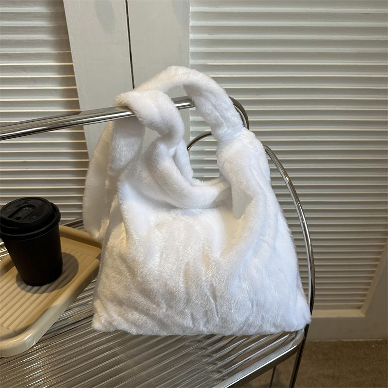 2025 Early Spring New Large Capacity Plush Trend Cow Pattern Personality Student Class Shoulder Bag Female Design Sense