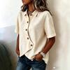 Women Light Blue Lapel Irregular Diagonal Button Short Sleeve Irregular Hem Loose Casual Blouse