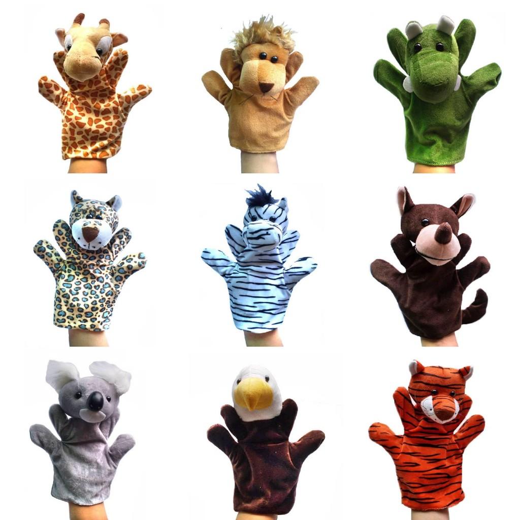 Weiche und entzückende Handpuppen von Gemeinschaftshelfern mit bunten Tiermotiven