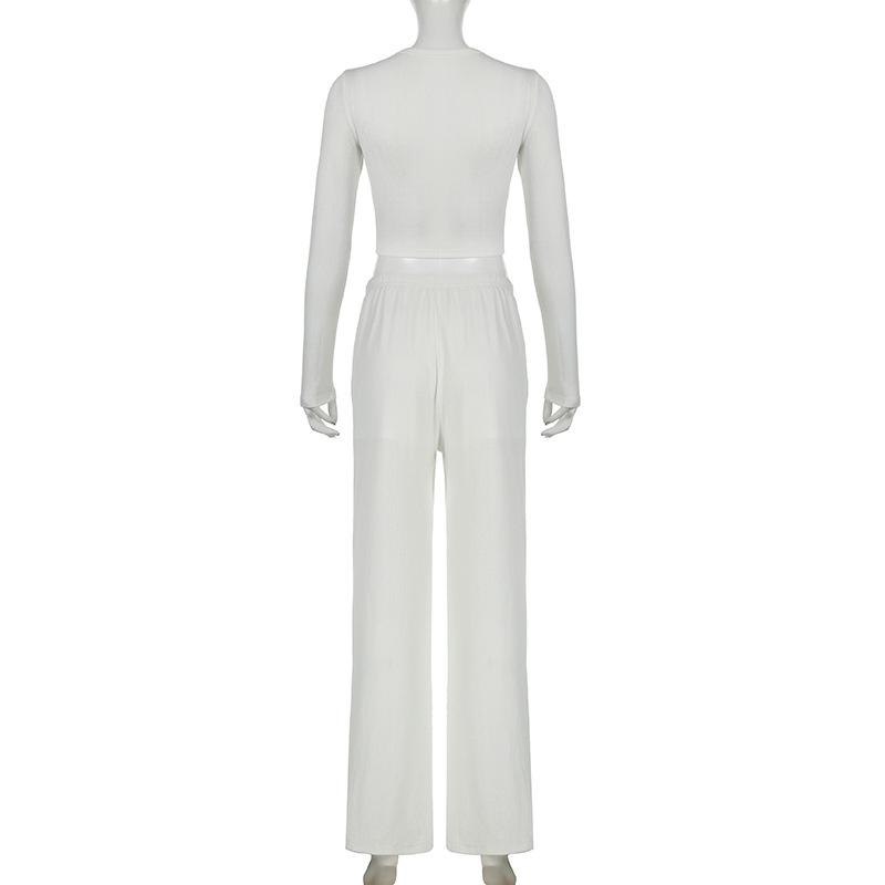 Jednobarevná pletená dvoudílná sada Dámský základní top s dlouhým rukávem a přezkou Elastické široké kalhoty Jednoduchý ležérní oblek Módní novinka jaro