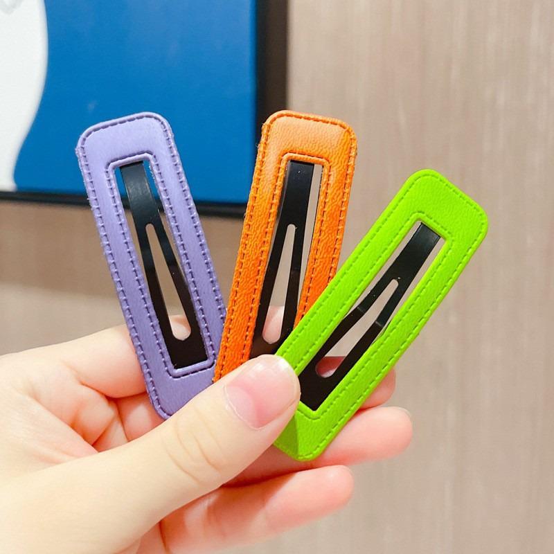 Candy Color PU Leather Hair Clip: Bun, Bangs & Side Clip for Women.