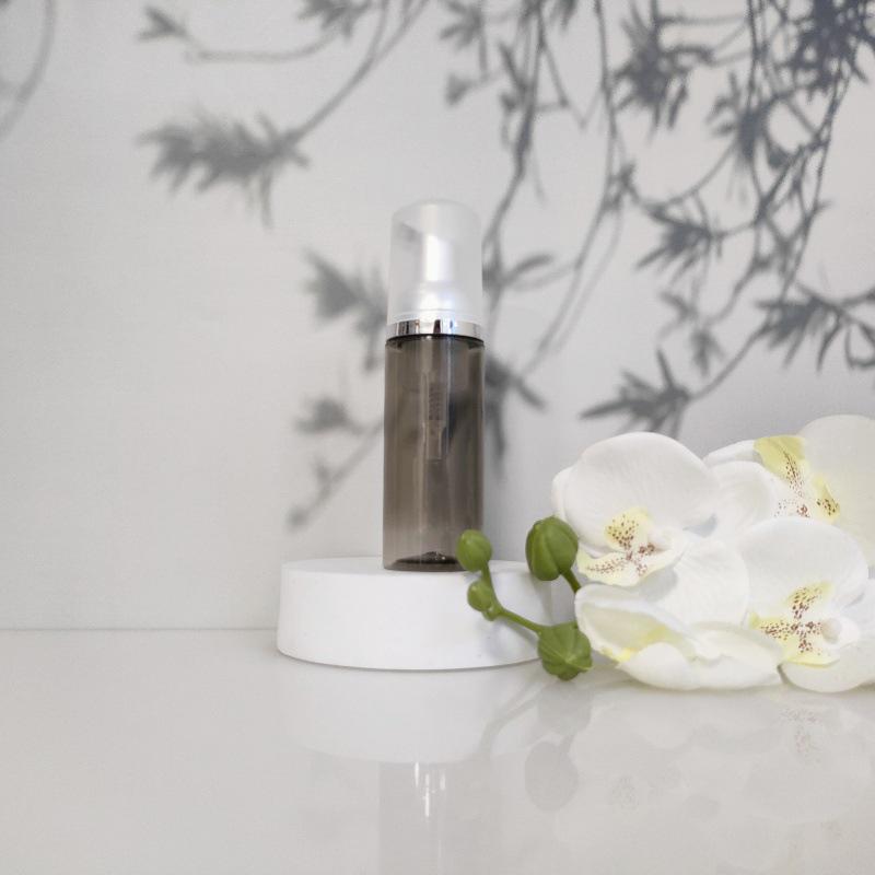 Available 60ml Transparent Black Foam Mousse Bottle for Face Wash and Travel-friendly Cosmetic Packaging.