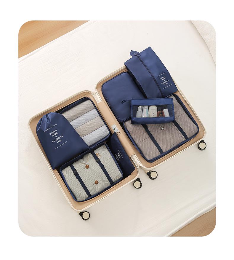 Seven-Piece Travel Packing Bag Set: Clothes, Underwear, Cosmetics, and More.