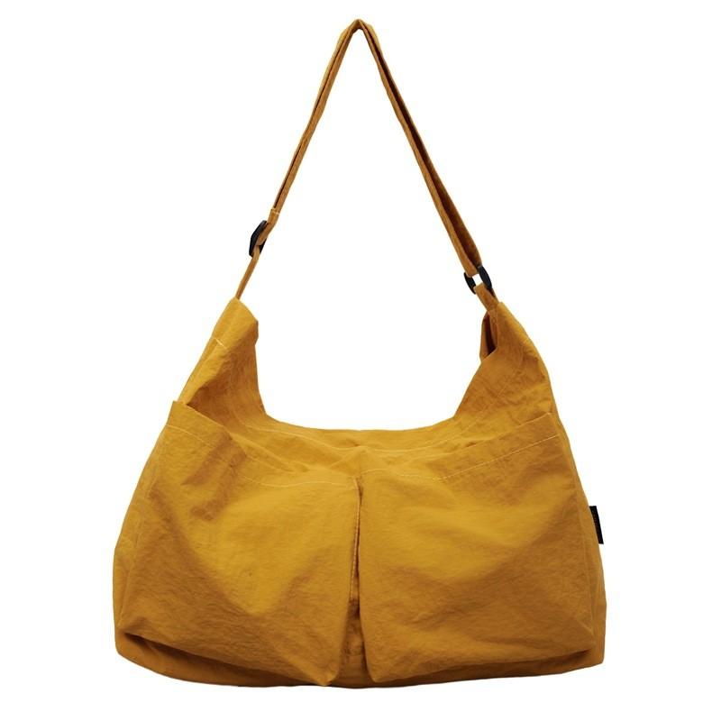 Borsa a tracolla minimalista in tela con chiusura a zip per uso quotidiano casual