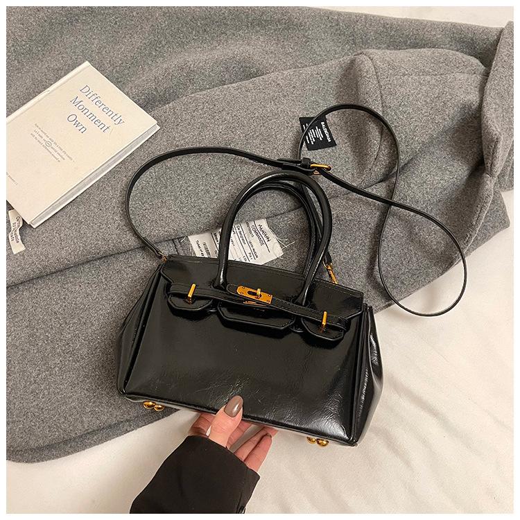 

Темпераментная женская сумка 2025 осень и зима новая модная текстура иностранный стиль сумочка для работы универсальная на одно плечо мессенджер сумка Kelly 23*11.5*17.5