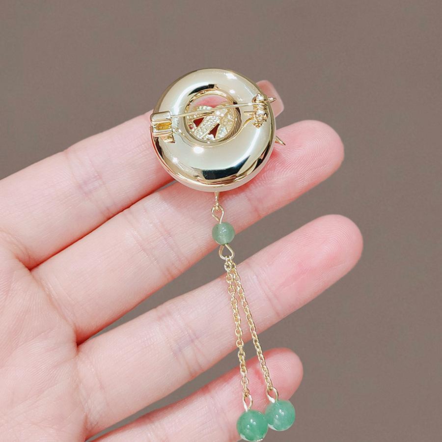 Bamboo press brooch female high-end sense niche tassel high-end bamboo leaf cheongsam corsage clothes pin