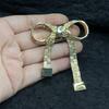 Vintage Copper-Plated Gold Tassel Bow Brooch - Versatile Sweater Corsage Accessory