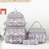 School bag new lightweight nylon backpack female cute cartoon three-piece set primary school students large-capacity school bag, fashionable