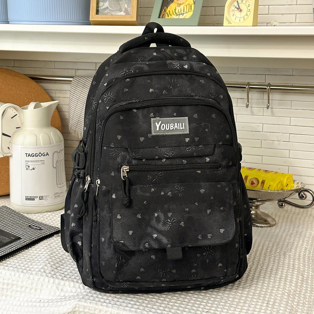 Schoolbag Korean version of high-value bow backpack for junior high school students, large-capacity schoolbag, casual trend, cute backpack.