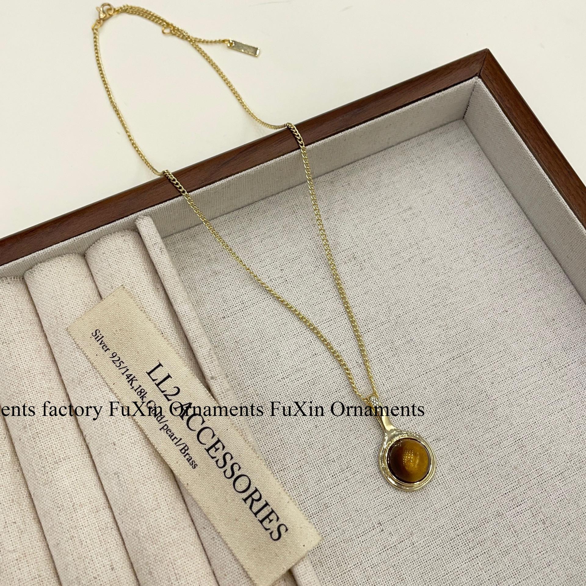 

2024 Fashion Tiger Eye Stone & Metal Beaded Necklace: Chinese Style Women’s Clavicle Accessory