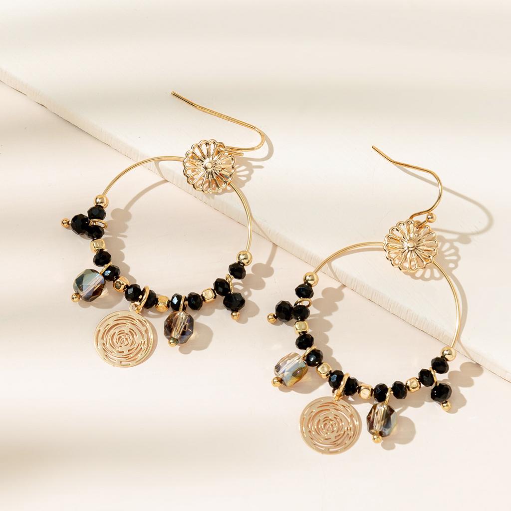 Exotic hollow fringed pendant earrings European and American women's vacation style earrings fashion earrings