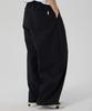 AT THE MOMENT Double-Pleat Strap Balloon Elastic Pants_Black