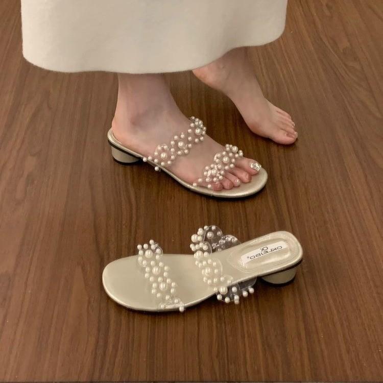 

Летом 2025 года новые жемчужные прозрачные однословные шлепанцы с открытым носком для женщин с юбками, сандалии на легком ветру для женщин 40 шампанского