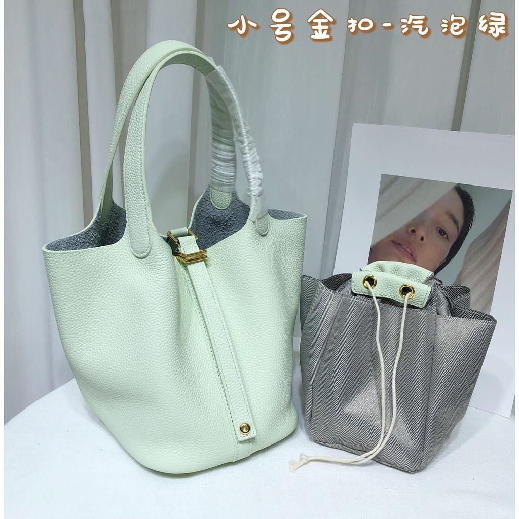 Spot wholesale top layer cowhide vegetable basket bag leather bucket bag commuter fashion lock buckle hand-held handbag woman