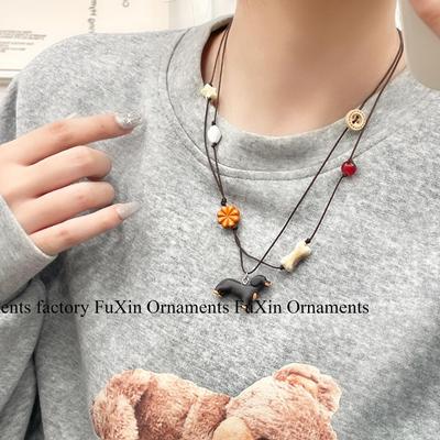 Handmade Dachshund Necklace: Cute, Stackable, and Versatile Sweater Chain for Women.