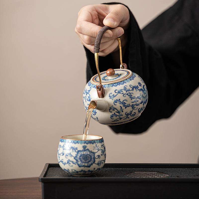 Ru kiln twisted branch lotus hand grab pot cover bowl teacup single high-end retro blue and white tea with lid ceramic kung fu tea set