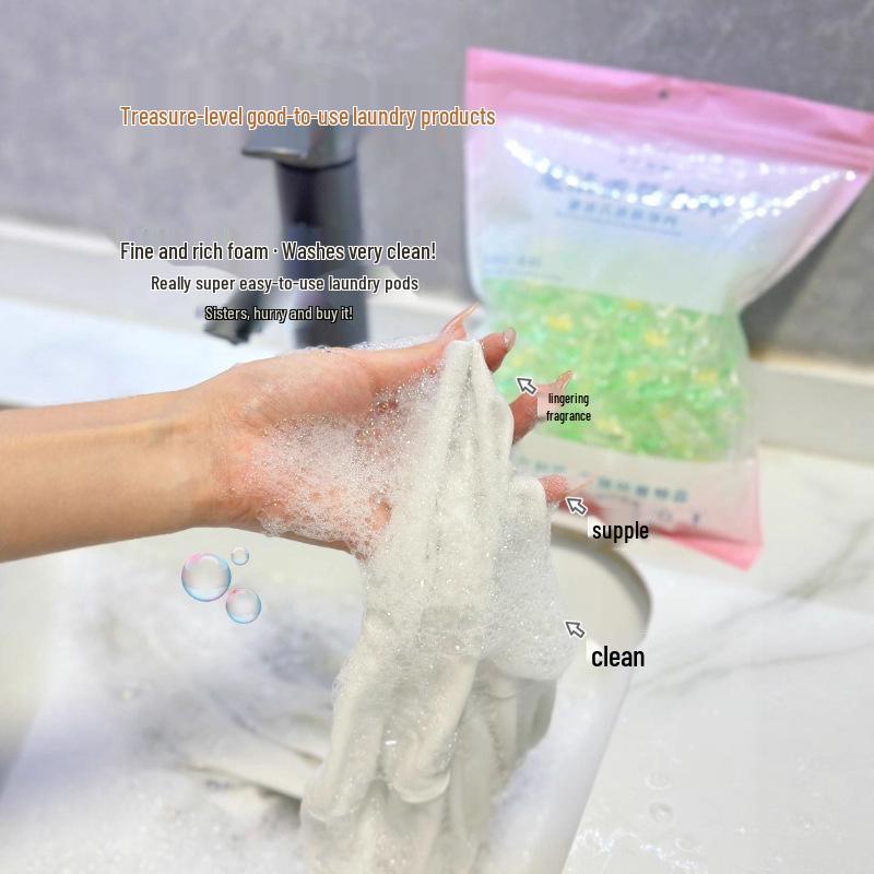 DM Camellia Scent Laundry Pods with Long-Lasting Fragrance, Stain Removal, and Softening Beads.