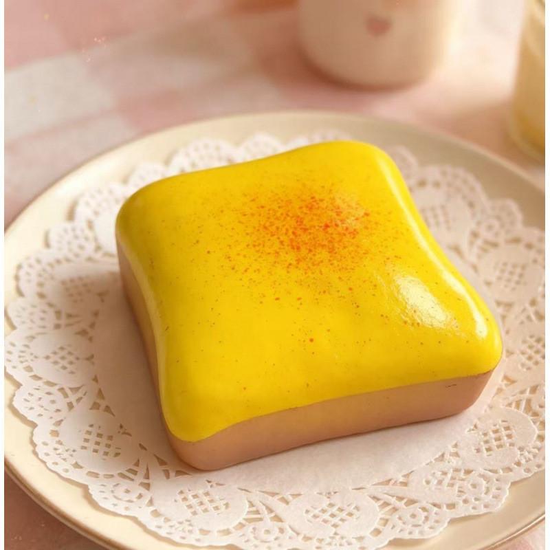 Miękka żółta zabawka-tost maślany na stres dla dzieci i dorosłych