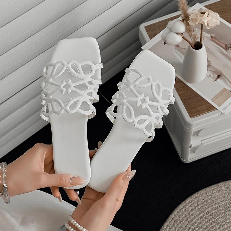 

Женские сандалии 2025 Лето Новые Повседневные Плоские Туфли Тренд Открытый Носок Удобные Шлепанцы для Ходьбы Дизайнерские Перфорированные Вьетнамки Обувь 36 белый