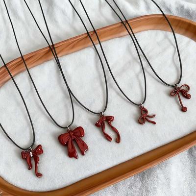 Geschenk Süßer Schleifenknoten Anhänger Halskette Coole Lederseil Halskette Reiner Wunsch Stil Tröpfelndes Öl Design Schlüsselbein Kette Mode