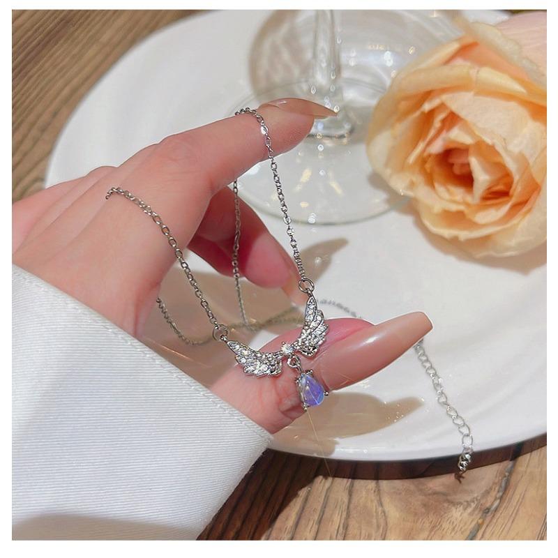 Women Light Luxury Minimalist Angel Wing Moonstone Drop Pendant Titanium Steel Clavicle Necklace