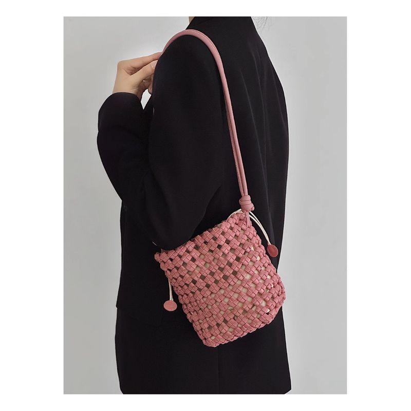 

Kaiboli Vegetable Tanning Leather Hand-Woven Bag 2025 New Arrival Summer Cut Out Bucket Bag Women s Shoulder Messenger Bag Pink