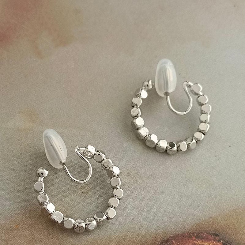 

Female Mosquito Repellent Coil Fashionable and Simple Earrings срібний